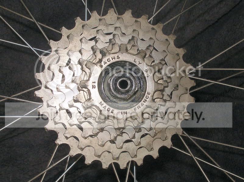 Roue Rétro 26 ARAYA RM 400 PRO Shimano Deore DX M650 7v 32h fh-m650 hb